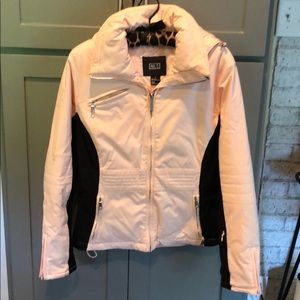 Nils ski jacket in pink and black. Zip off hood